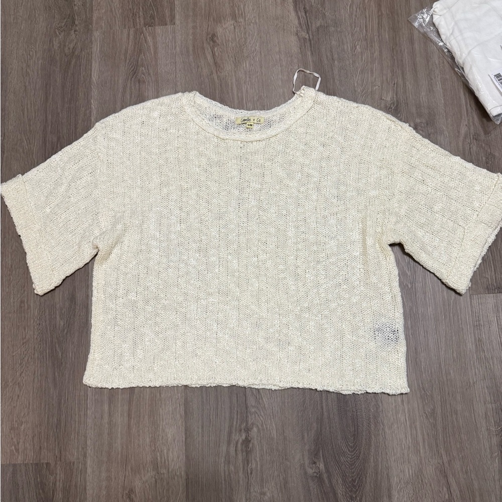 New Camille & Co ivory sweater. It is oversized just a little. Size s/m